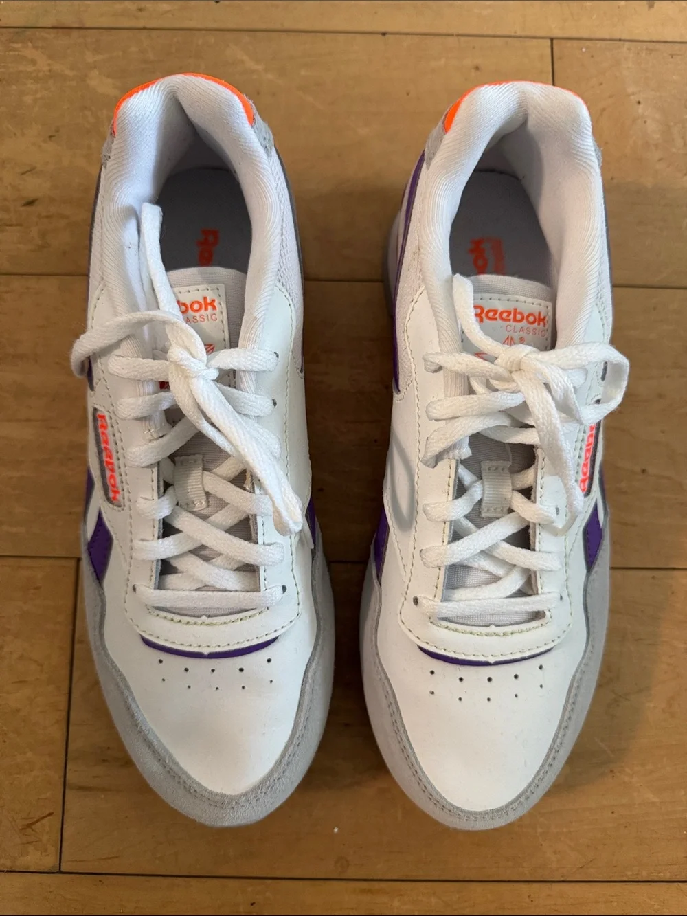 Reebok Women's White Sneakers with Purple and Orange Accents